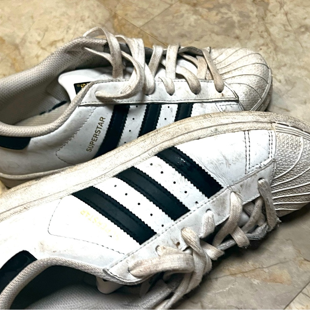 Womens Adidas Superstar sneakers worn